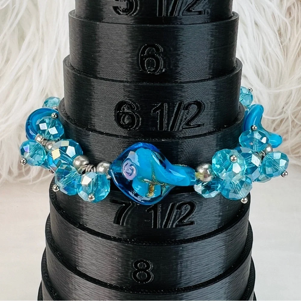 Beautiful reflective blue beaded glass stretch bracelet